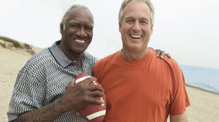 Two Older Men With a Football